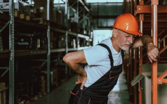 Warehouse worker with back pain